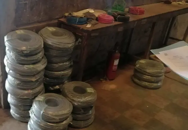 Stacked coils of electrical cable