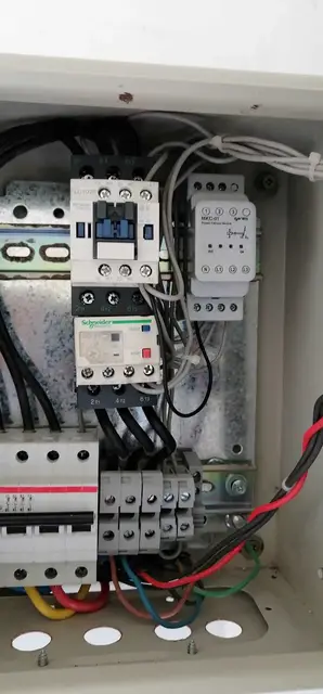 Motor control panel with contactor and overload relay